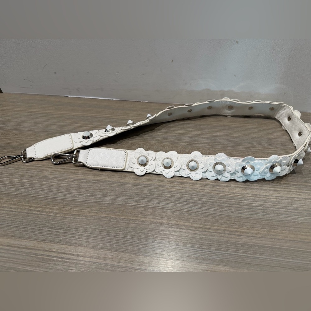 White Floral Bag Strap with silver detail.